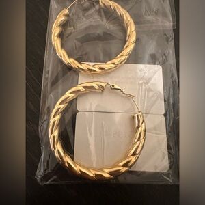 Brand new 18k gold plated stainless steel earrings.